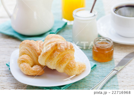 Romantic breakfast Croissants, coffee and yogurt Romantic breakfast Croissants, coffee and yogurt 22716968