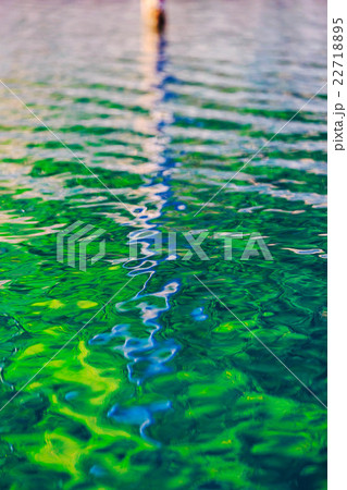 Colorful shadow on water background 22718895