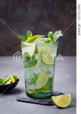 Mojito cocktail with lime and mint in glass Mojito cocktail with lime and mint in glass 22721381