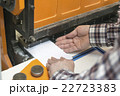 cutting papers by guillotine machine 22723383