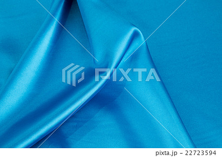 Some soft folds of light blue silk cloth. 22723594