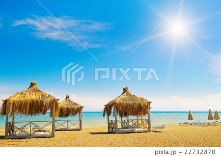 sandy beach, awnings and sunbeds 22732870