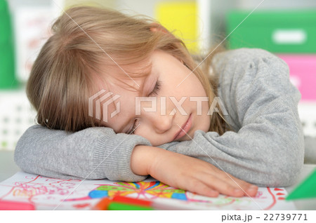 student girl sleeping on books student girl sleeping on books 22739771