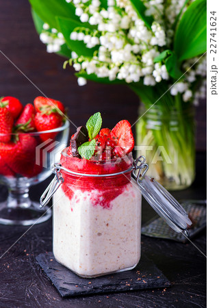 Healthy overnight oats with strawberry in jars Healthy overnight oats with strawberry in jars 22741624