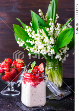 Healthy overnight oats with strawberry in jars 22741625