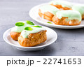 cream dessert eclair with fresh mint leaves 22741653