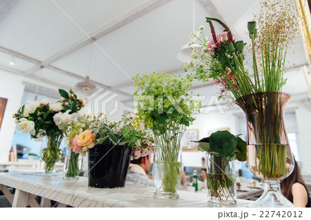 Beautiful spring flowers in glass vases 22742012