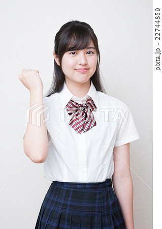 女子高生 ガッツポーズ の写真素材