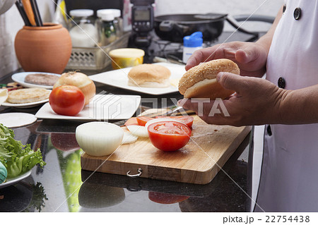 Chef prepared burger before cooking Hamburger Chef prepared burger before cooking Hamburger 22754438