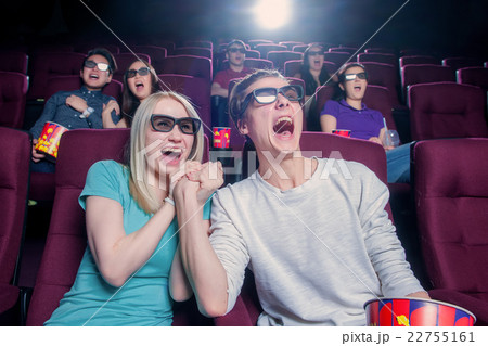 People in the cinema wearing 3d glasses People in the cinema wearing 3d glasses 22755161