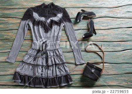 Dark dress and heel shoes. Dark dress and heel shoes. 22759655