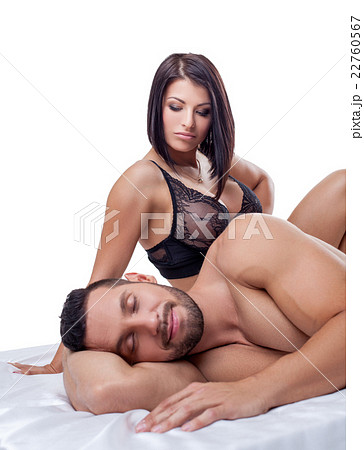 Hot brunette discontentedly looks at man dreaming 22760567