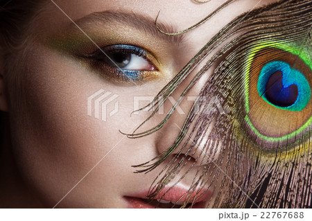 Beautiful girl with bright colored makeup and Beautiful girl with bright colored makeup and 22767688