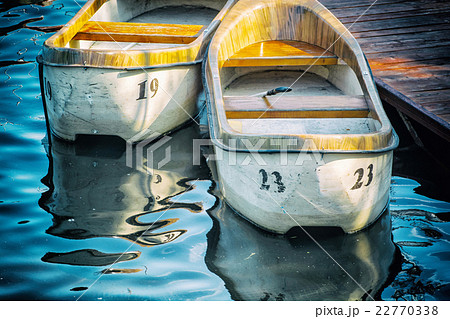 Two old boats at the pier 22770338