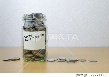 Money saving for savings in the glass bottle 22771159