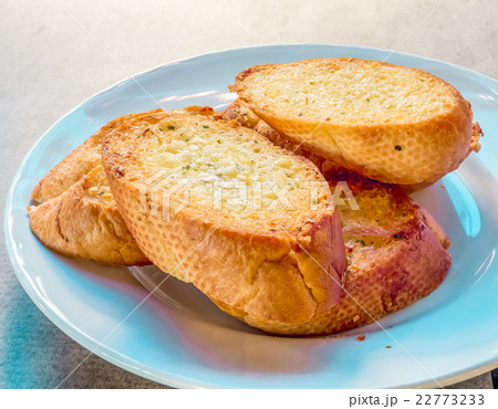 Garlic bread on table 22773233
