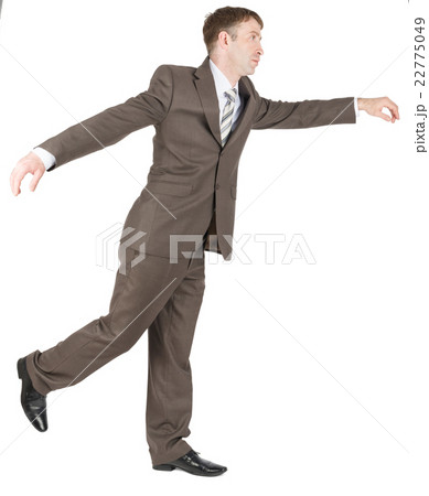 Businessman balancing on one leg 22775049