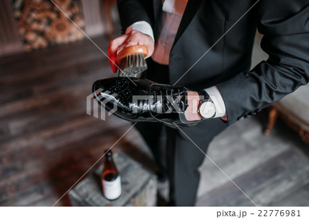 Cleaning shoes on wooden background. black shoe 22776981
