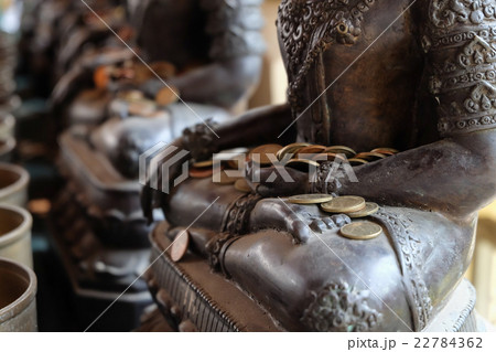 Angel statue with put the coins by donors Angel statue with put the coins by donors 22784362