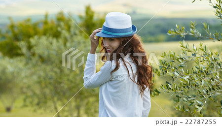 woman smiling happy on sunny summer or spring day woman smiling happy on sunny summer or spring day 22787255