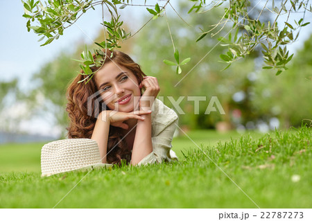 woman smiling happy on sunny summer or spring day woman smiling happy on sunny summer or spring day 22787273