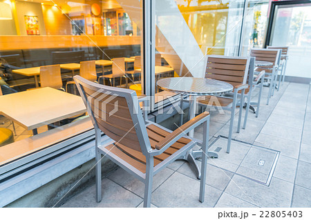 Tables and chairs in restaurant 22805403