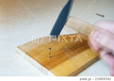 Nail hammering Nail hammering 22809582