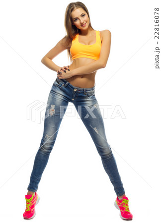 Young sporty girl in jeans 22816078