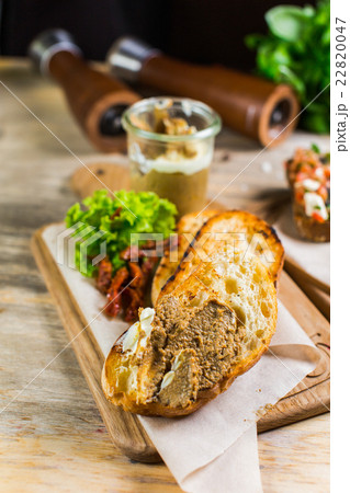 Beautiful fresh sandwiches with meat pate, cherry Beautiful fresh sandwiches with meat pate, cherry 22820047