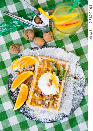 Belgian waffle with honey sauce, oranges, walnuts, 22820101