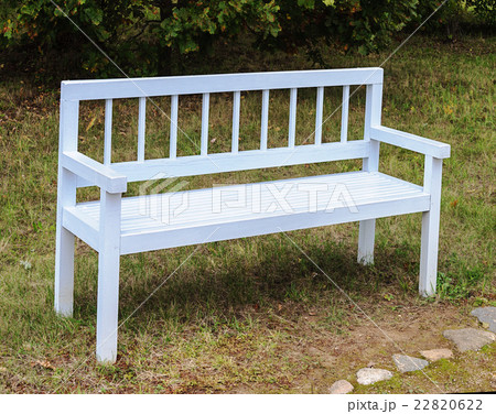 White wooden bench in park 22820622