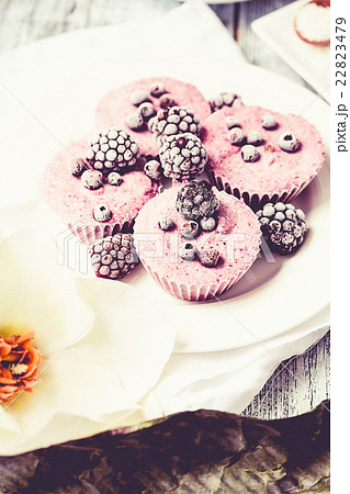 raw vegan berry cheesecake with coconut, portioned raw vegan berry cheesecake with coconut, portioned 22823479