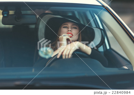 Woman sexually touching lips. 22840984