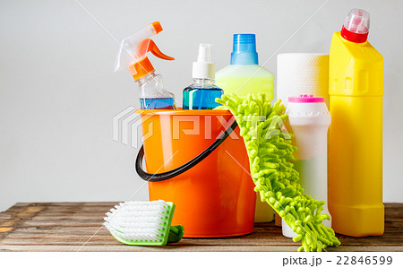 Bucket with cleaning items on light background 22846599