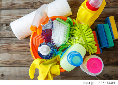 Plastic bucket with cleaning supplies on wood Plastic bucket with cleaning supplies on wood 22846604