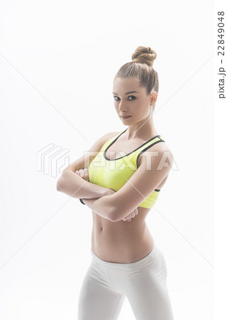 Beautiful slim sportswoman is posing in sportswear 22849048