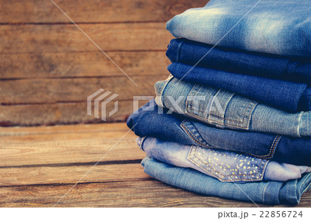 Pile of jeans clothes  22856724
