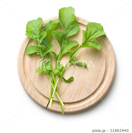 arugula leaves on cutting board arugula leaves on cutting board 22862940