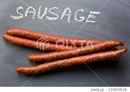 dried sausages on chalkboard 22863026
