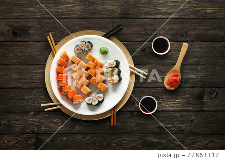Set of sushi maki and rolls at rustic wood. 22863312