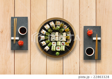 Set of sushi maki and rolls at wood. Set of sushi maki and rolls at wood. 22863328