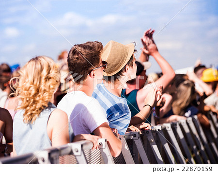 Teenagers at summer music festival, at the barrier Teenagers at summer music festival, at the barrier 22870159