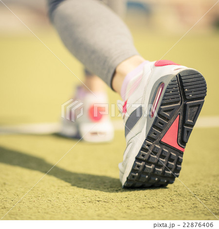 Sportswoman start running at the stadium Sportswoman start running at the stadium 22876406