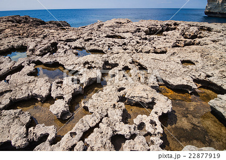 Volcanic rock coast in the Azure Window 22877919