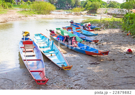 Boats at the Nam Song river in Vang Vieng, Laos. Boats at the Nam Song river in Vang Vieng, Laos. 22879882
