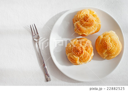 Profiteroles, choux with cream, anglaise dessert Profiteroles, choux with cream, anglaise dessert 22882525