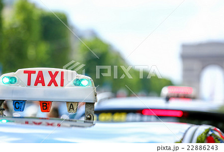 Parisian taxi in the city Parisian taxi in the city 22886243