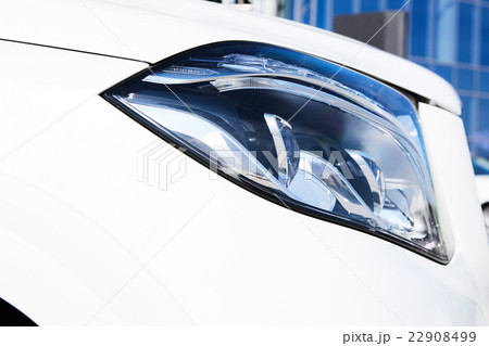 Closeup headlights of luxury car. 22908499