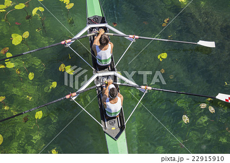 Two rowers  rowing 22915910