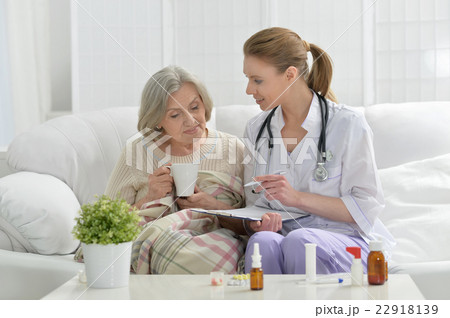 doctor and her senior senior patient doctor and her senior senior patient 22918139